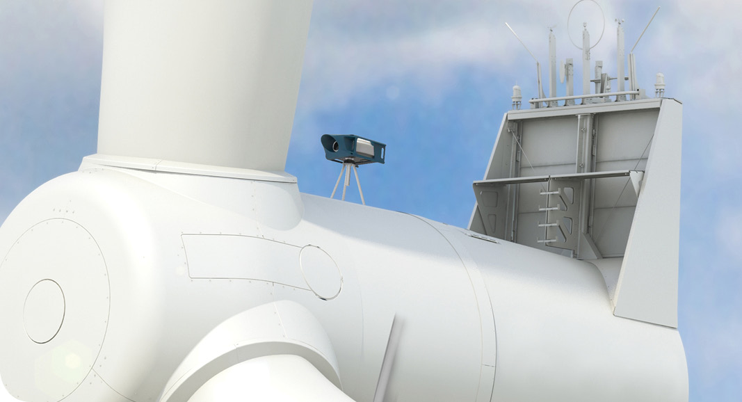 A nacelle-mounted forward-looking LiDAR unit on top of a wind turbine, looking out ahead of the rotor
